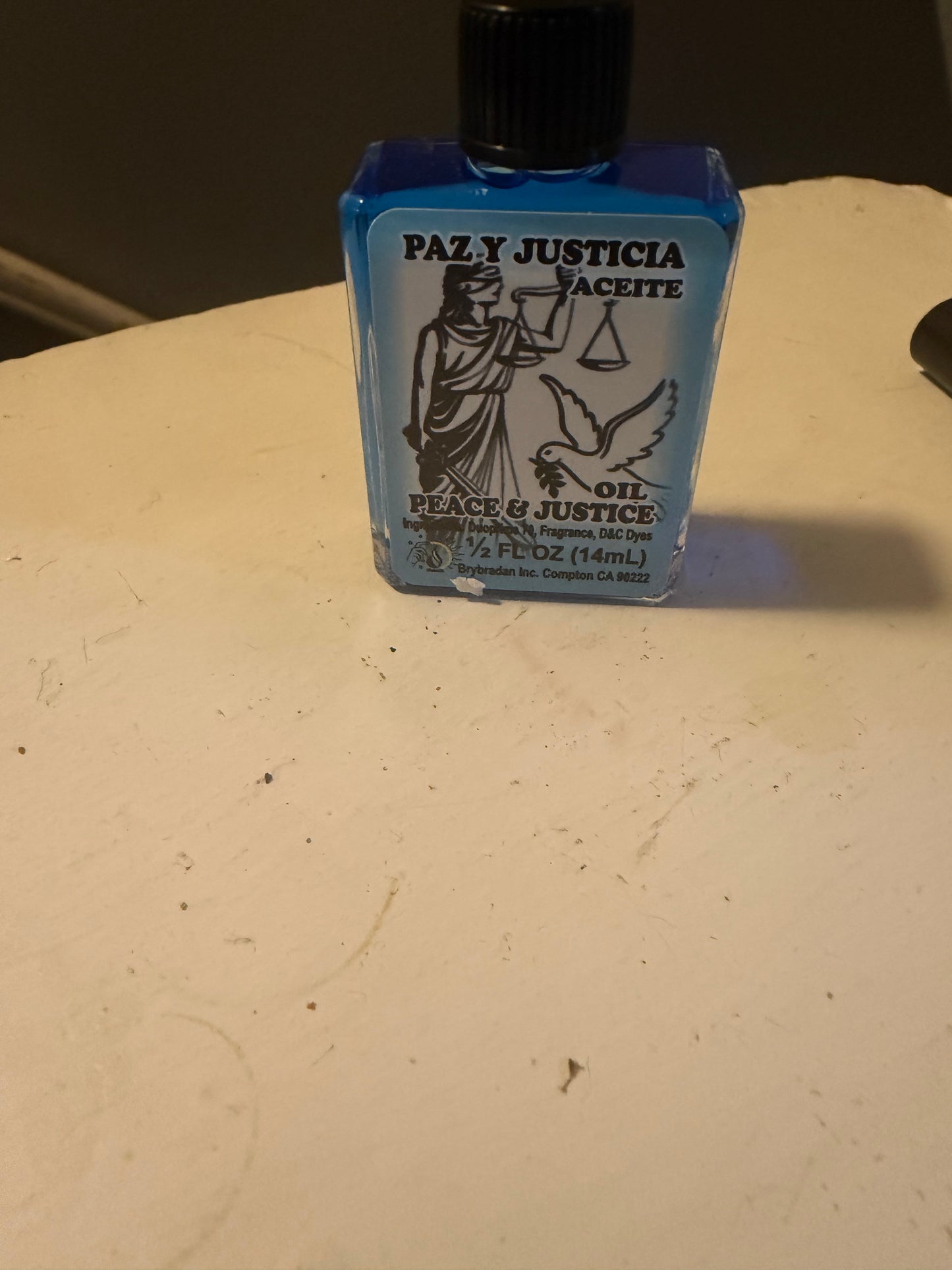 Peace & Justice Spiritual Oil – ½ oz (14 mL)
Invite peaceful energy, balance, and positive intentions into your spiritual practice with Peace & Justice Spiritual Oil (Paz y Justicia Aceite). Traditionally used in spiritual and intention-setting practices